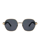 Óculos de sol feminino octogonal dourado modelo Milano LURVANI, vista frontal em fundo branco.
